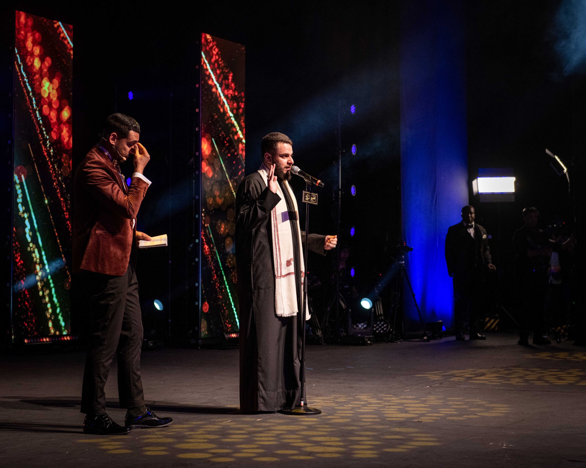 Ali Zuhairi speaking on The Shia Voice stage